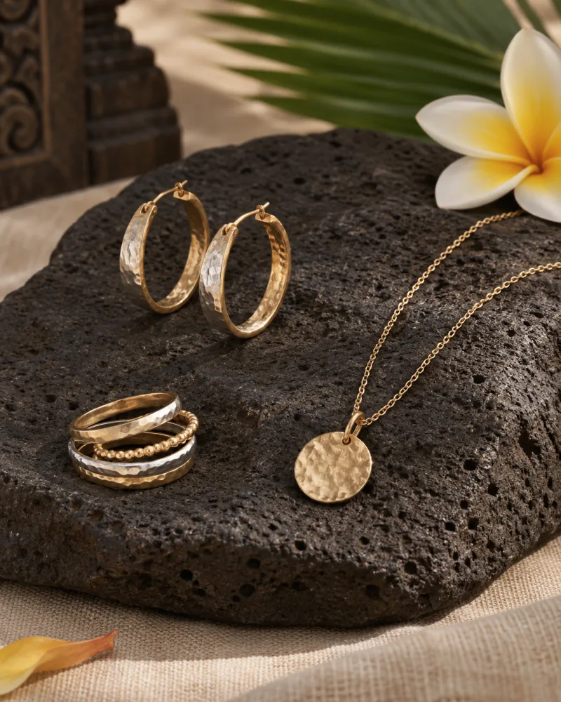 Set 04. Coordinated necklace, bracelet and earrings beside a Balinese offering