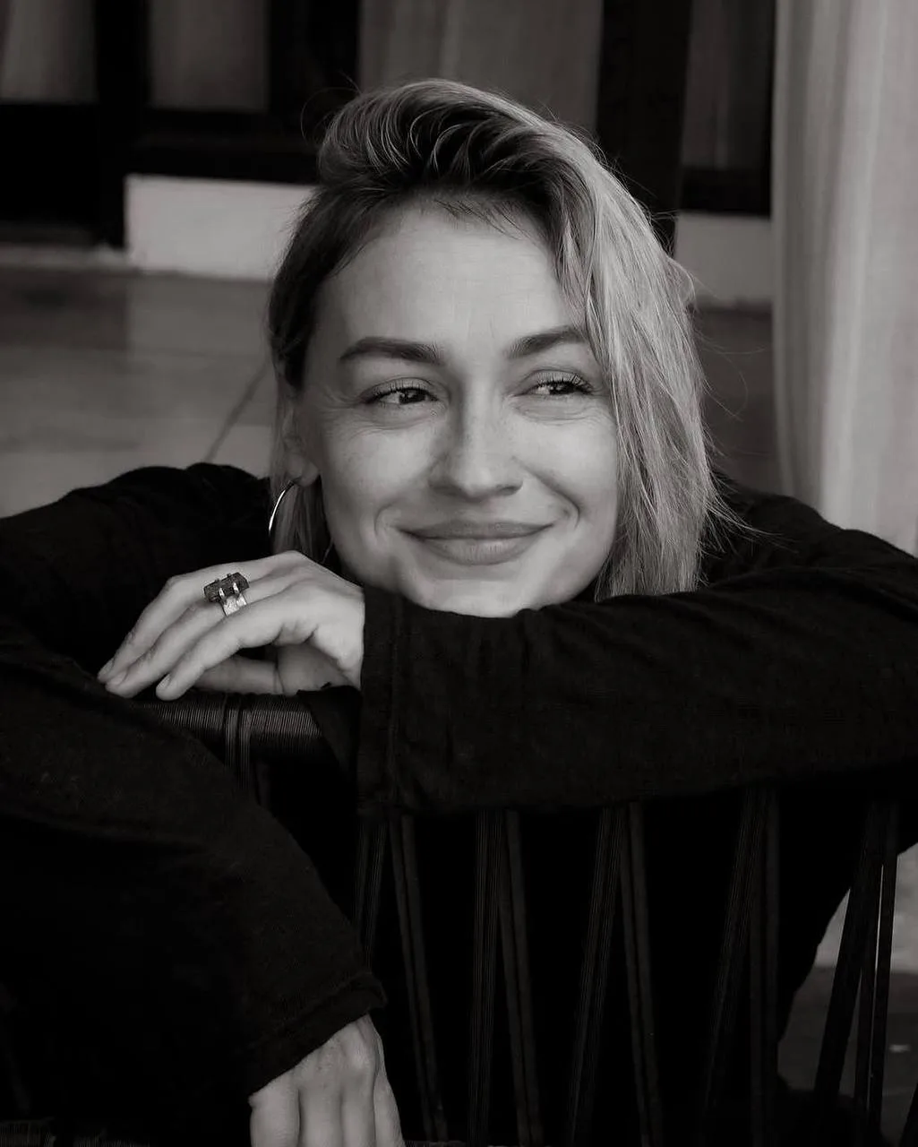 Black-and-white portrait of Maria, founder of Metta Within
